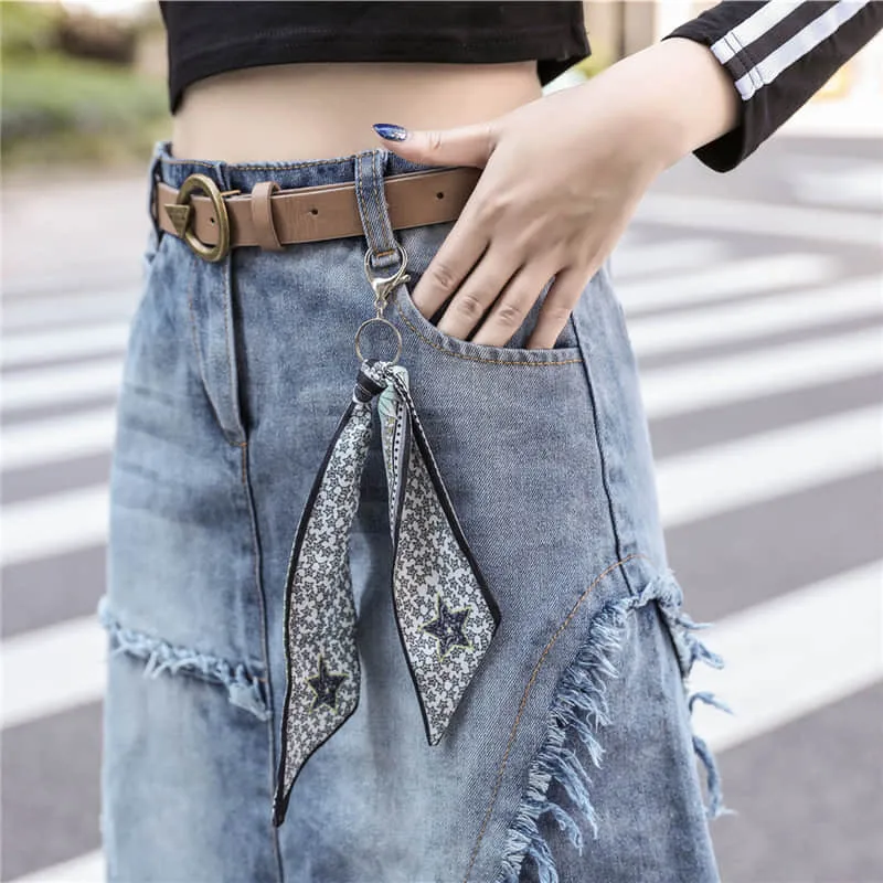 Mid-length irregular A-line skirt with raw edges